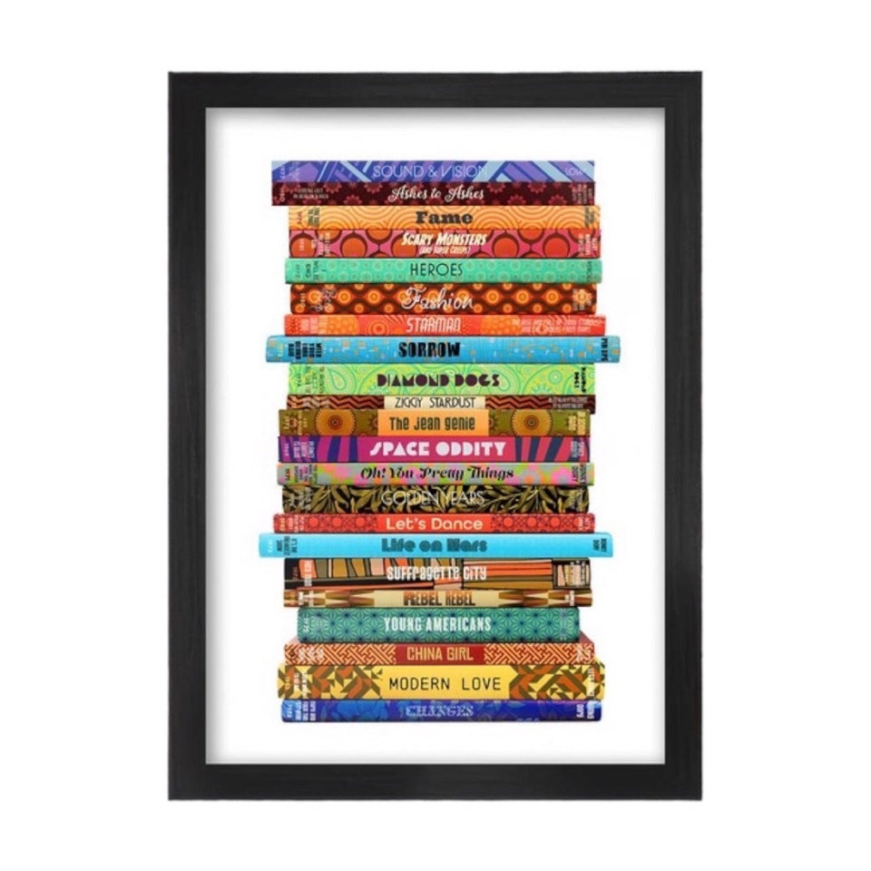 This print features a stack of books, each one representing one of Bowies most famous songs with a spine design inspired by that song, from Fame to Space Oddity to Modern Love.