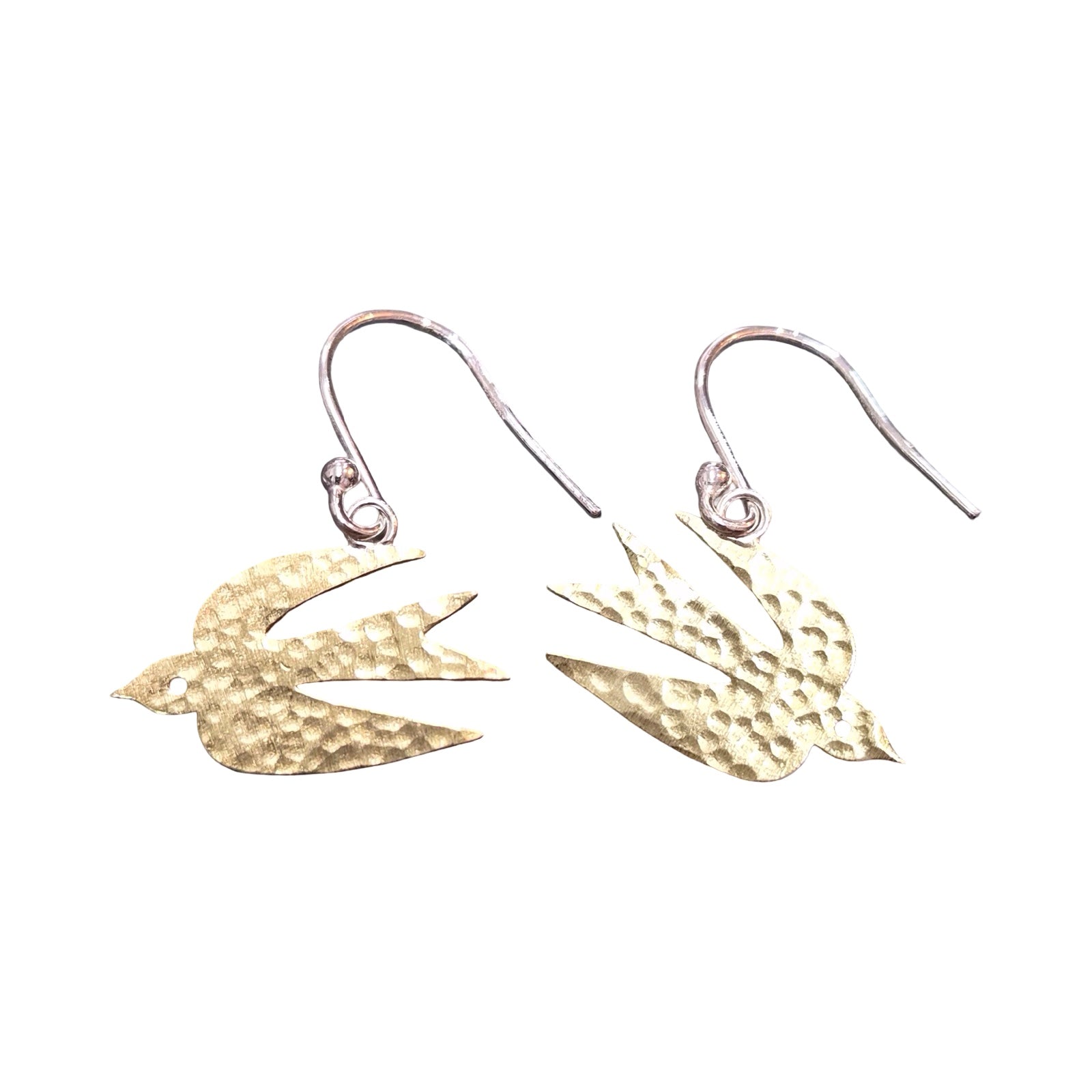Gold swallow-shaped earrings on a white background.