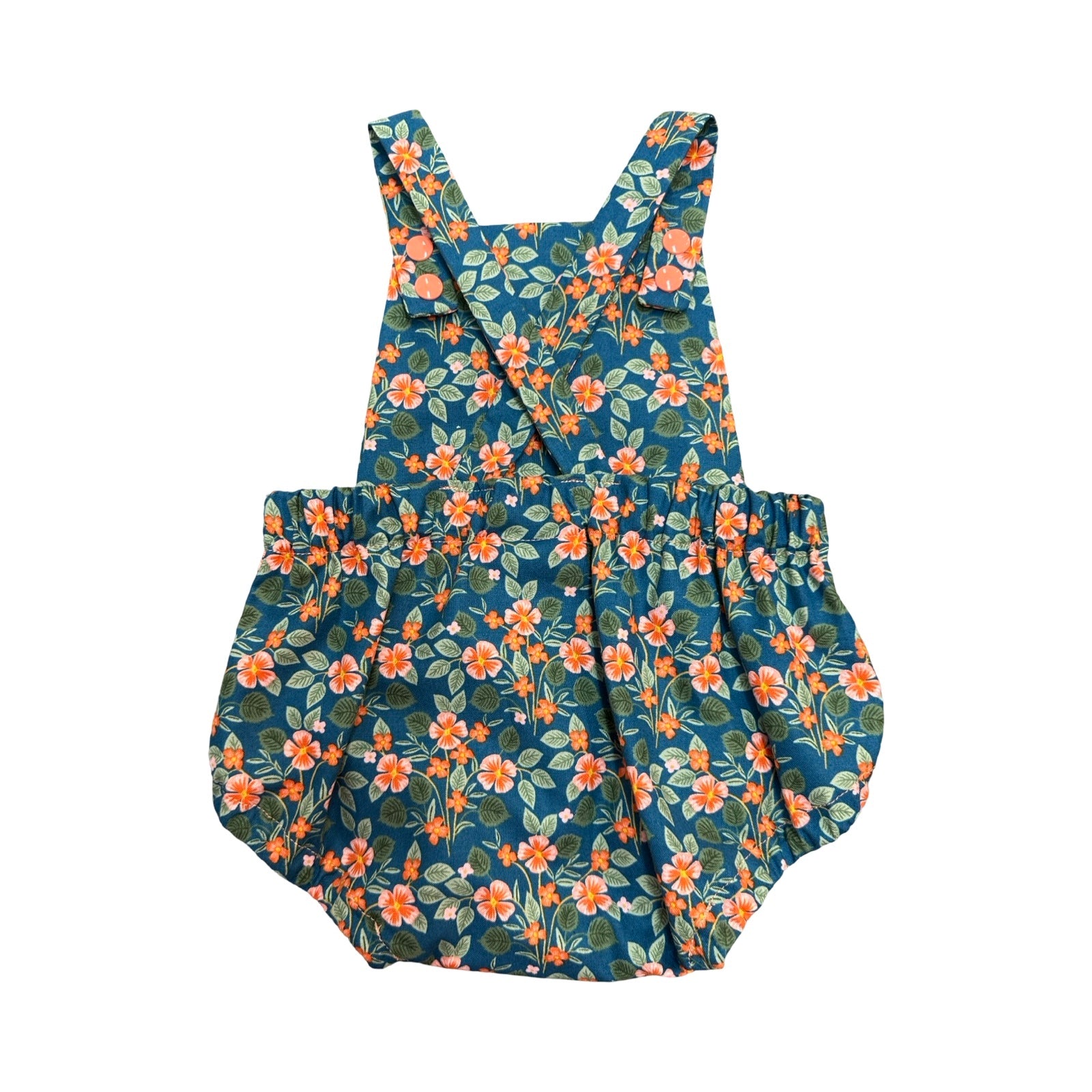 Floral-patterned romper on a white background.