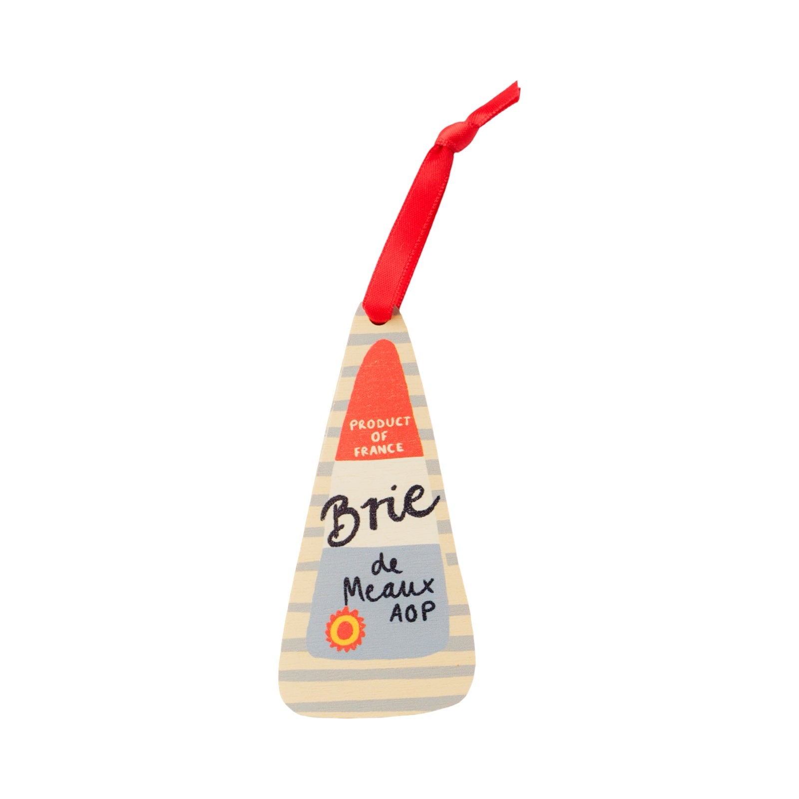 Toy shaped like a wedge of Brie cheese with a red string on a white background.
