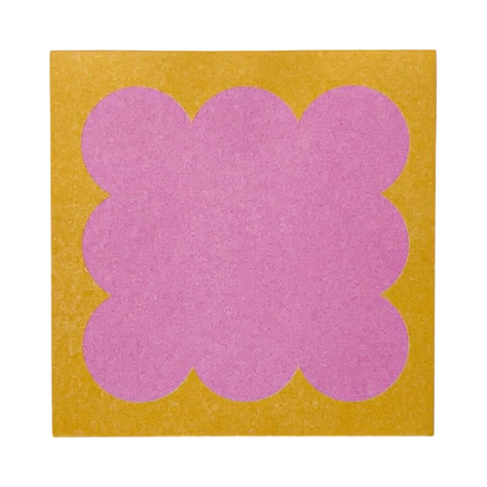 Pink and yellow memo pad on a white background.