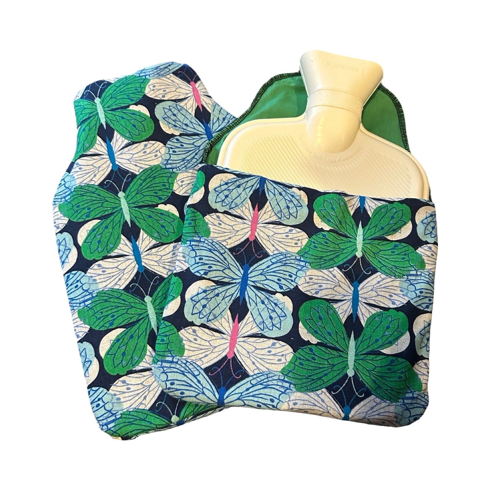 This hot water bottle cover is made from a layer of navy canvas with a butterfly pattern on the outside, a layer of green cotton on the inside and a cosy felt layer in the middle.