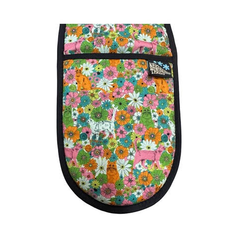 Cat oven gloves with pink, orange and pale green cats hiding in a meadow of flowers.