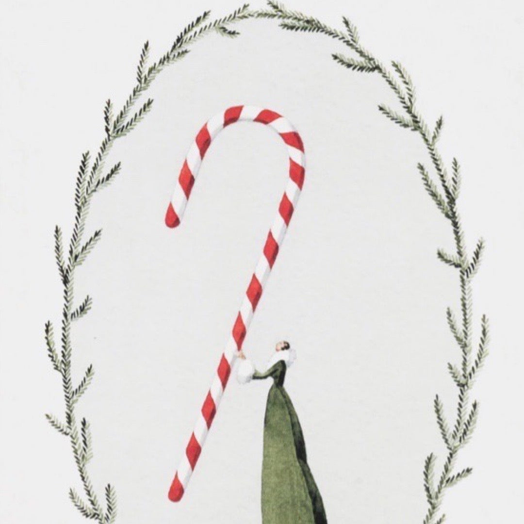 Christmas card featuring a lady in a beautiful green dress holding a giant red and white striped candy cane, framed by green foliage.