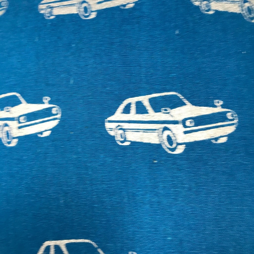White car illustrations on a blue textured background.