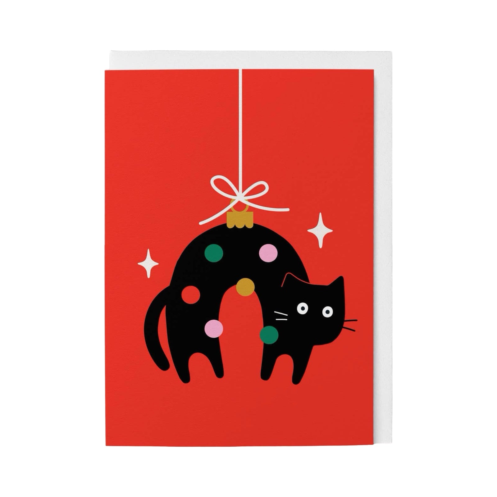 Christmas card featuring a black cat hanging like a Christmas bauble.