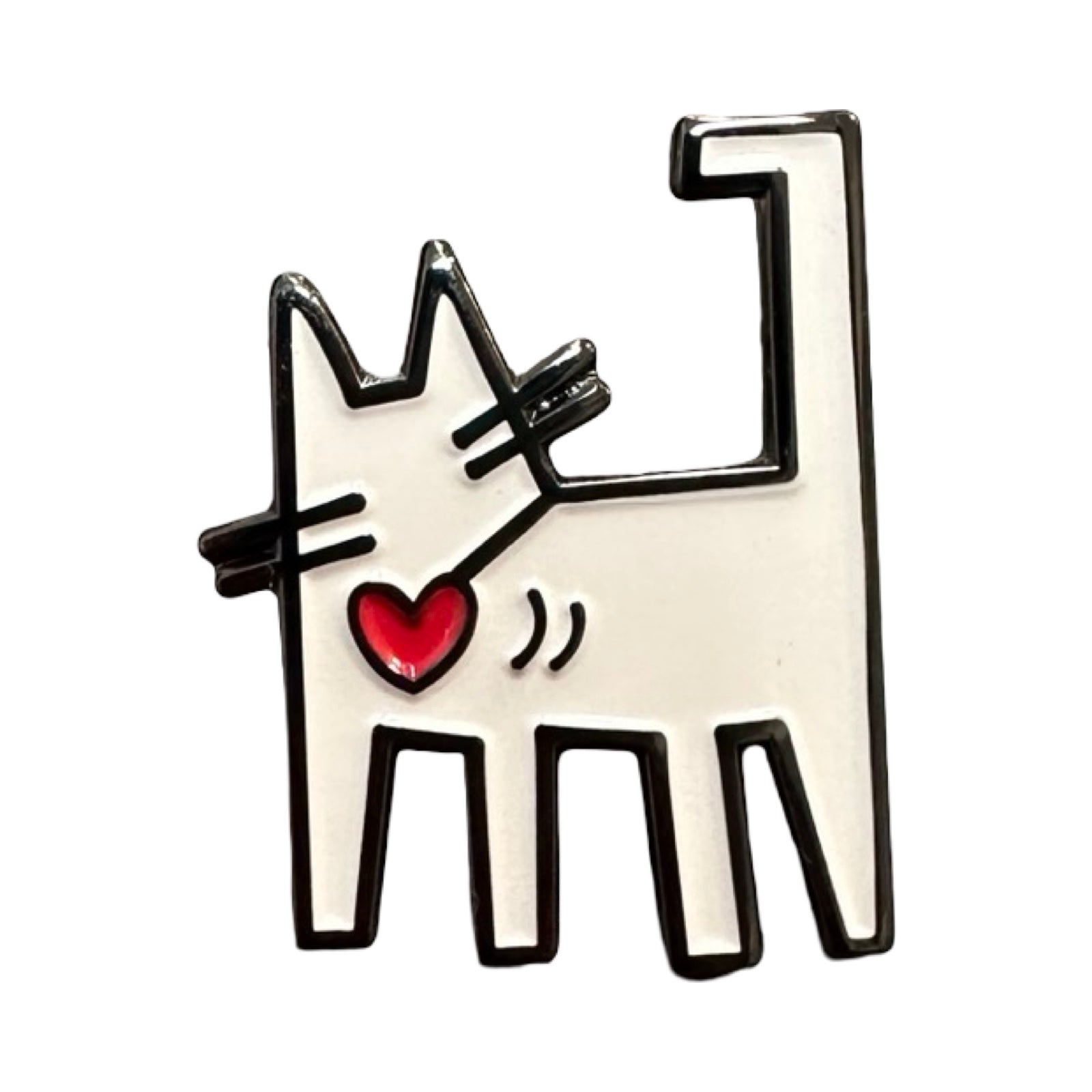 White cat enamel pin badge with a red love heart hanging from its collar, inspired by the work of the pop art master Keith Haring.