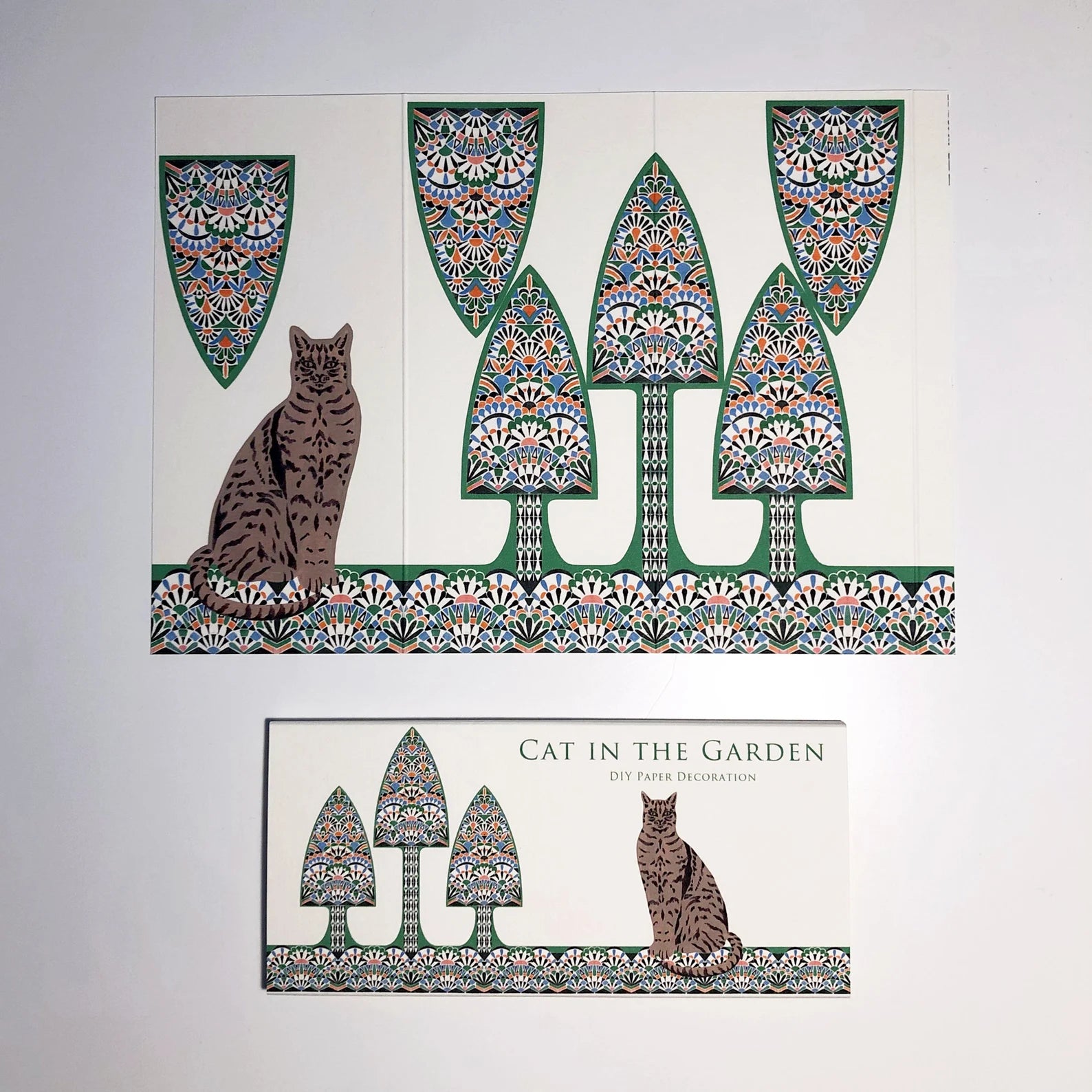 Decorative design with a cat and trees on a white background.
