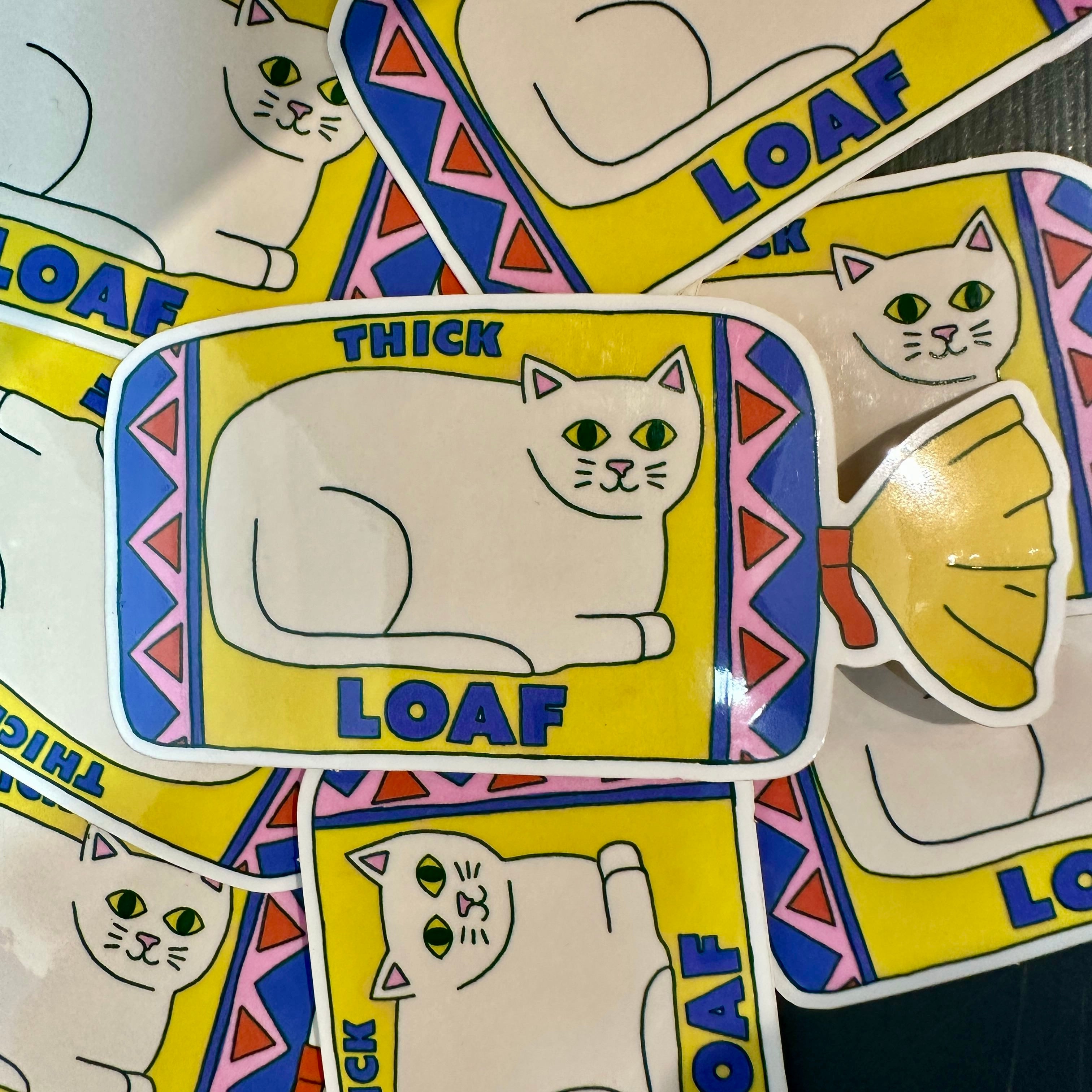 Stickers with cat illustrations and 'LOAF' text on a colourful background.