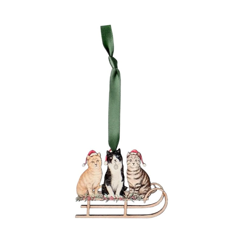 Wooden Christmas decoration of 3 cats on a sleigh. 