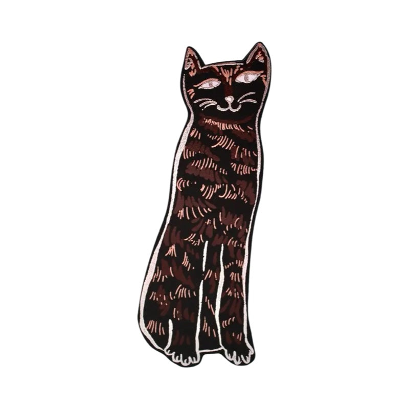 A cat-shaped leather bookmark in black with silver embossed details.