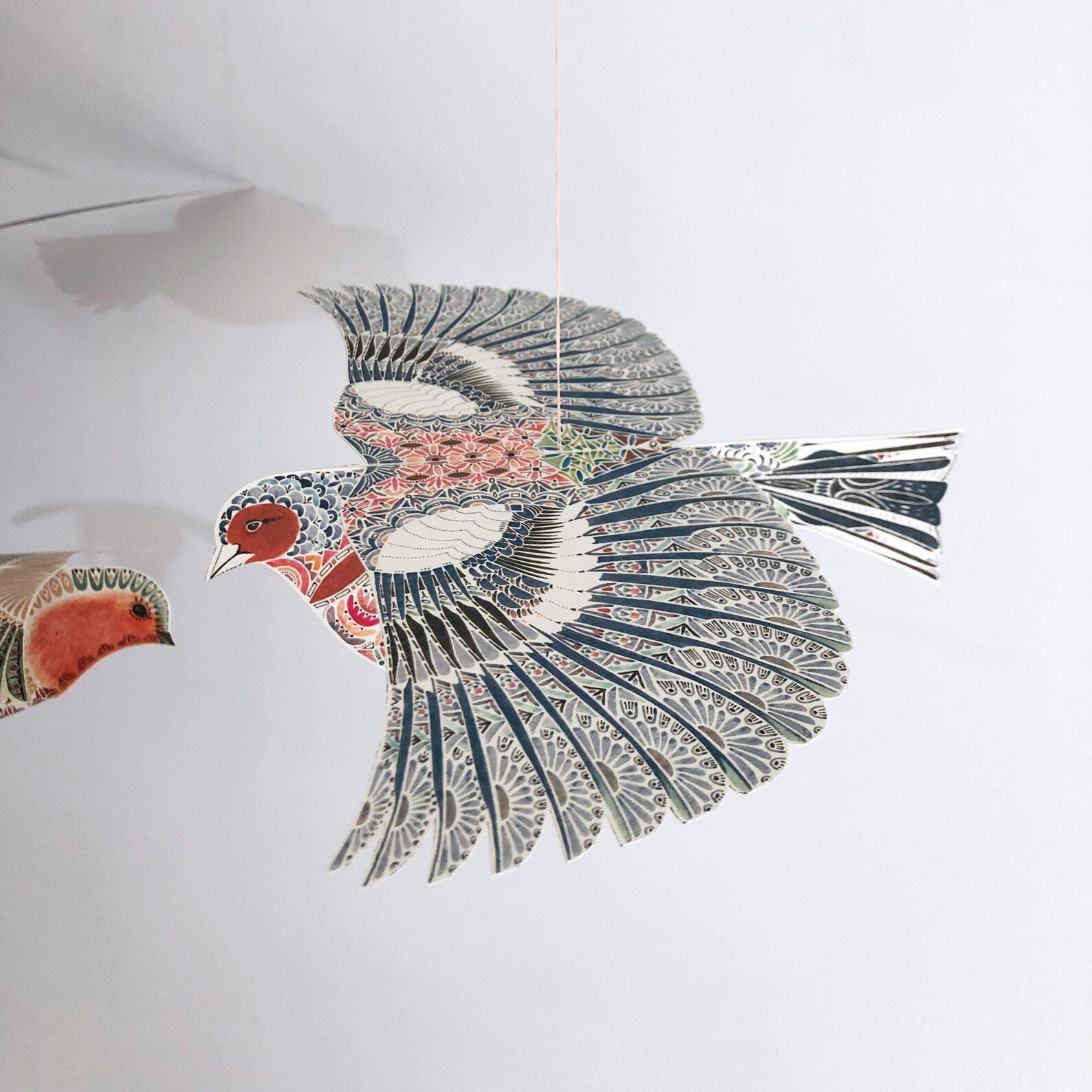 Decorative bird on a white background.