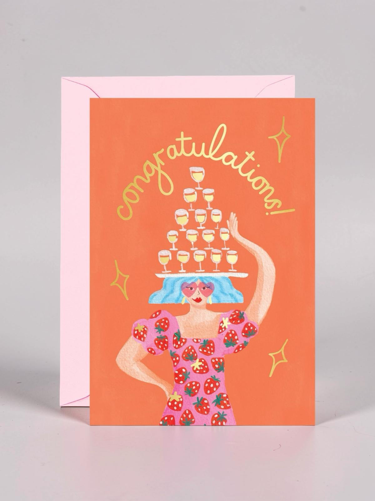 Greeting card with illustration of a woman holding a tower of glasses and 'Congratulations!' text on an orange background.