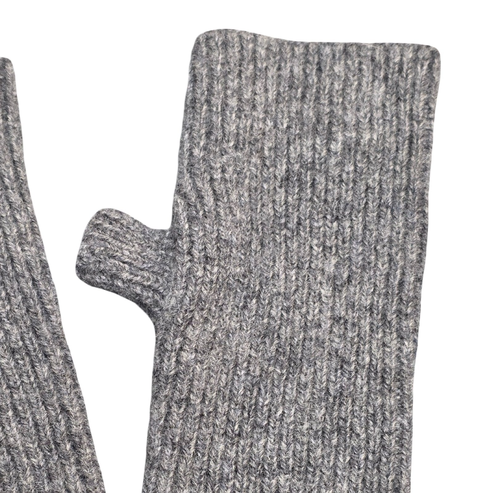 These charcoal grey ribbed woollen wrist warmers have been knitted using 100% light grey British lambswool. 