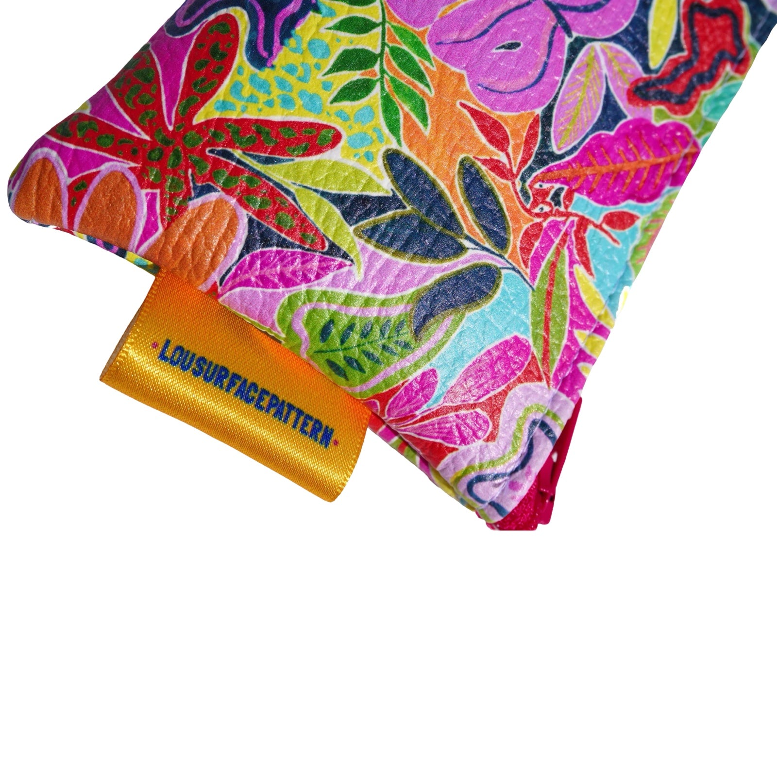 Vegan leather is printed in a bright and colourful tropical leaves design.
