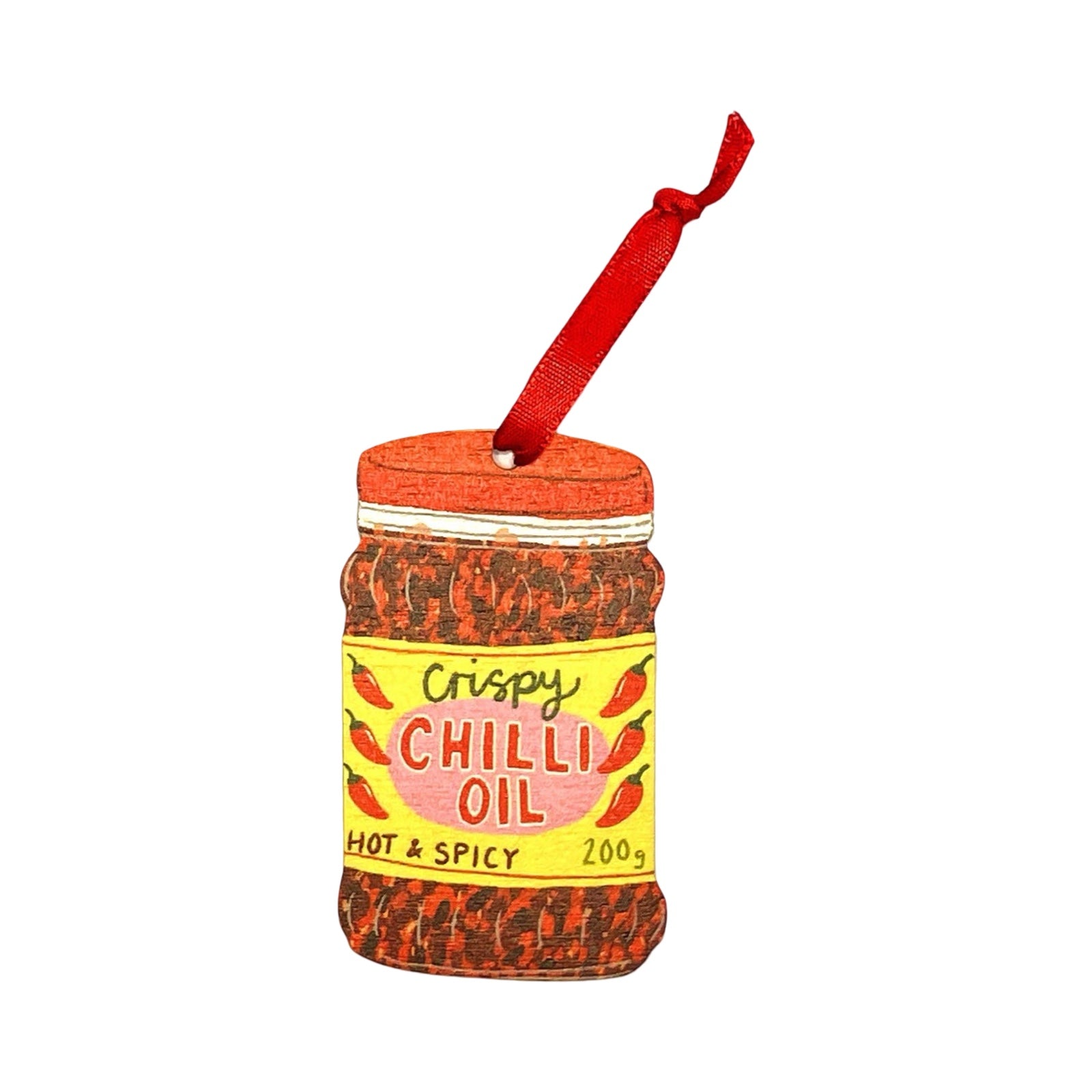 A wooden Christmas decoration of a jar of chilli oil.