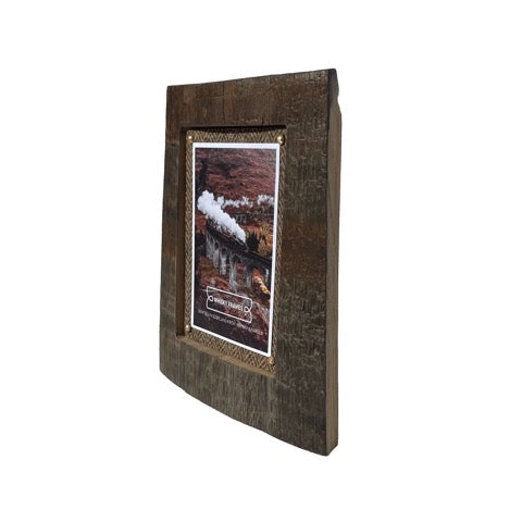 The Chime frame is handmade from the ends of the whisky barrel staves and can be freestanding or wall-mounted. 