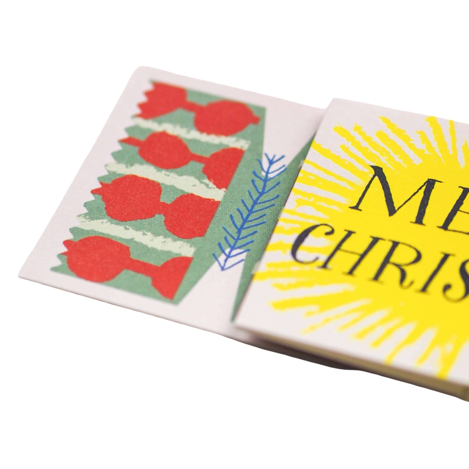 Greeting card with 'Merry Christmas' text on a white background.