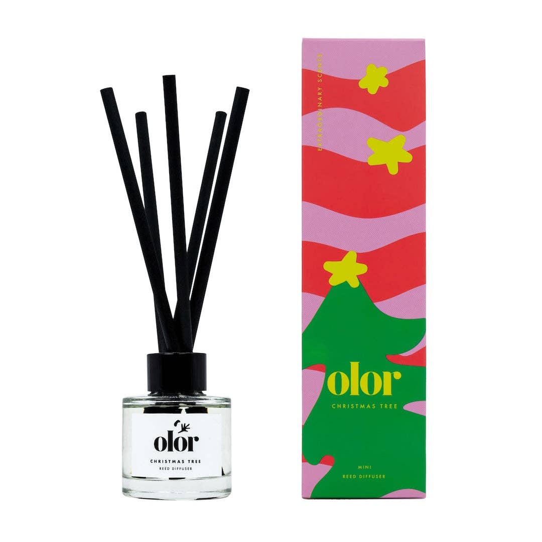Diffuser with black sticks and a colorful 'olor' packaging on a white background
