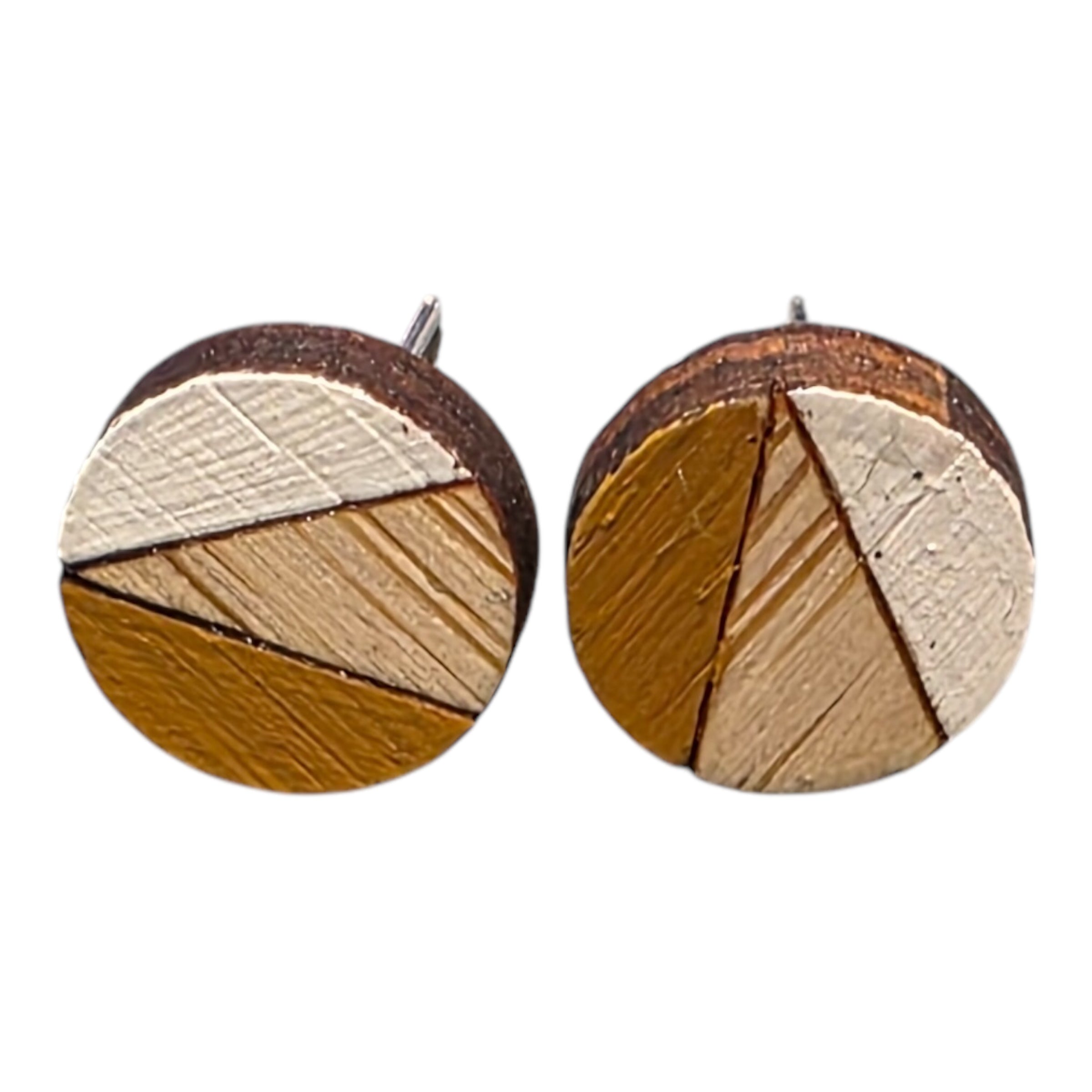A pair of mustard and white painted circular wooden stud earrings.