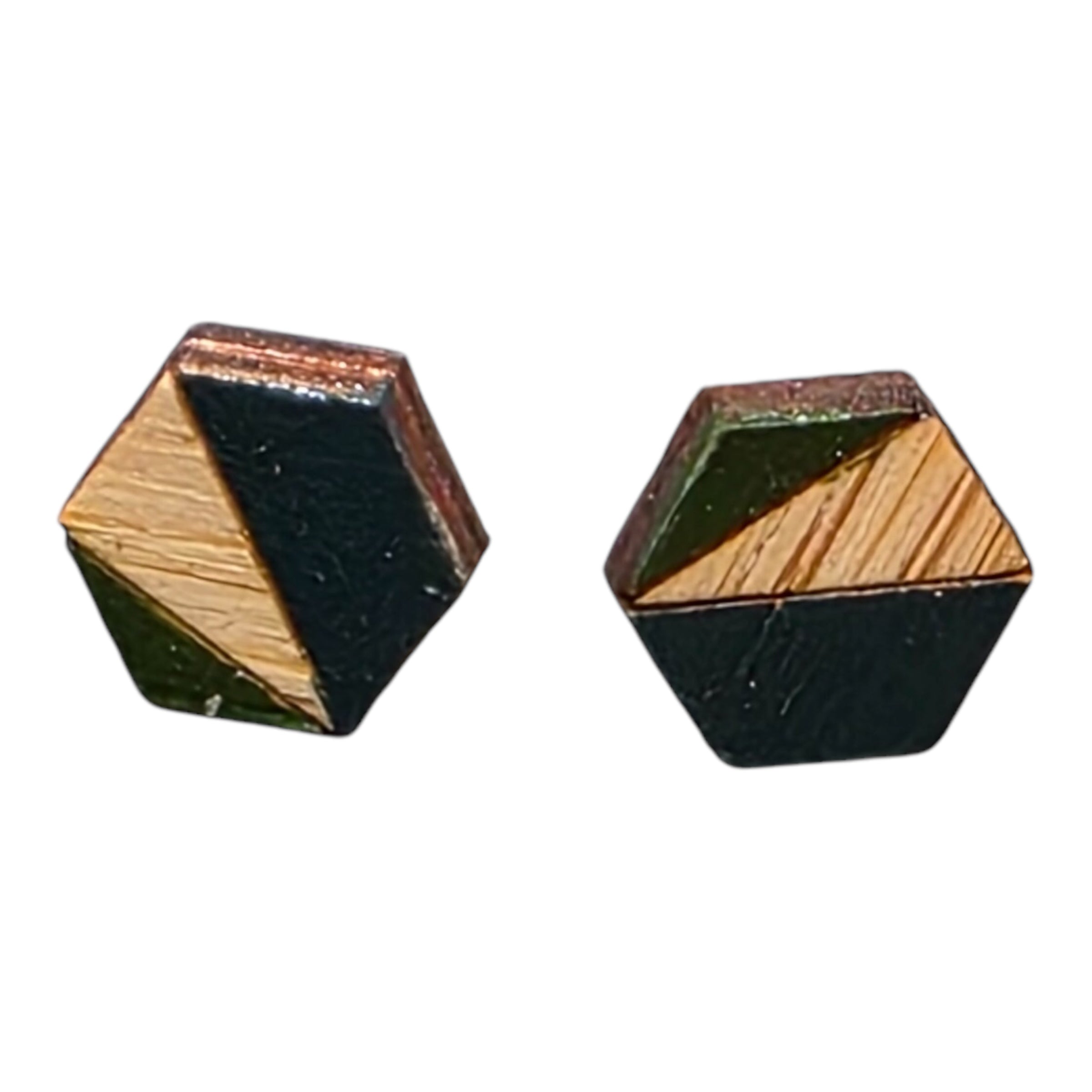 A pair of green and navy hexagonal bamboo stud earrings in a small metal tin.