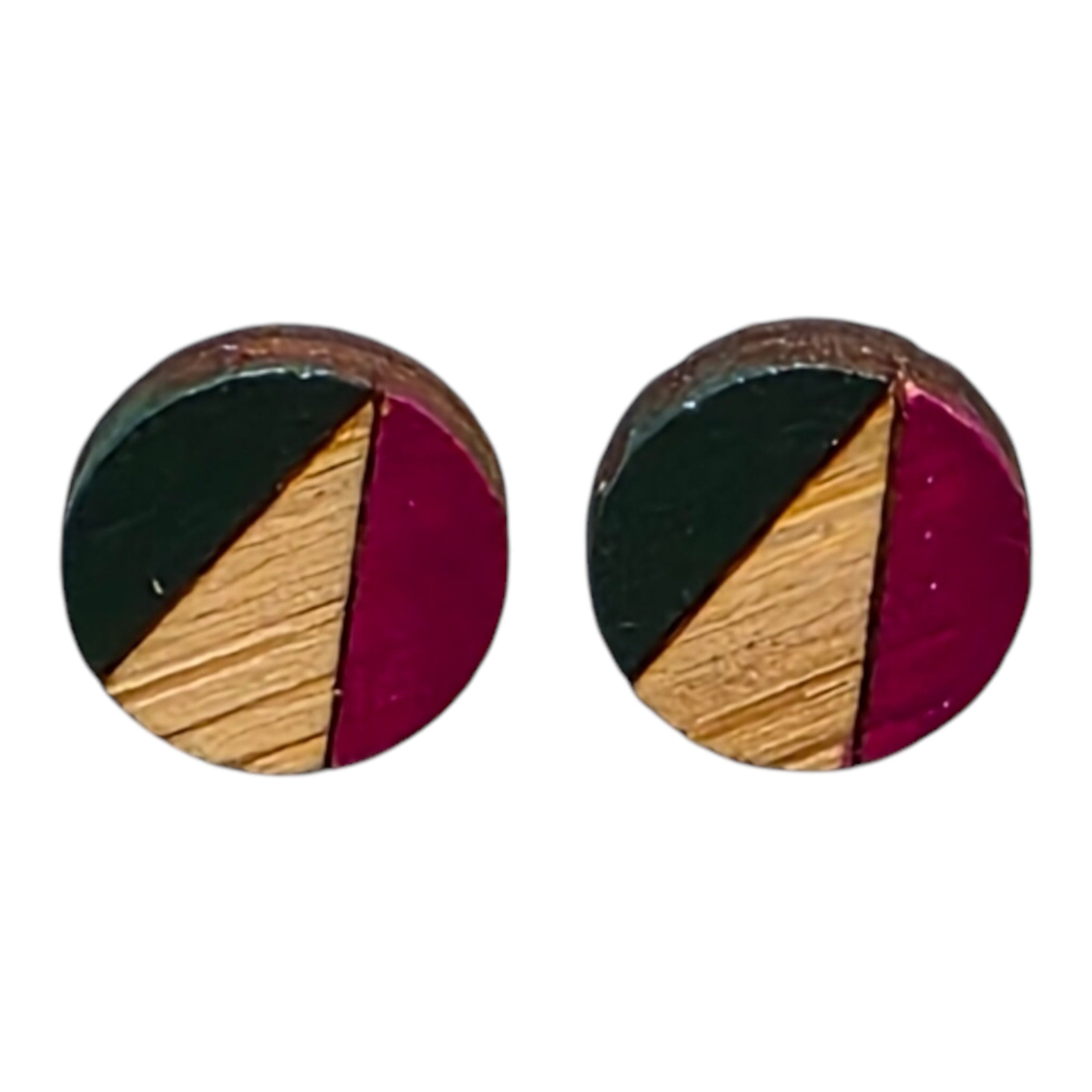 A pair of pink and navy painted circular wooden stud earrings.