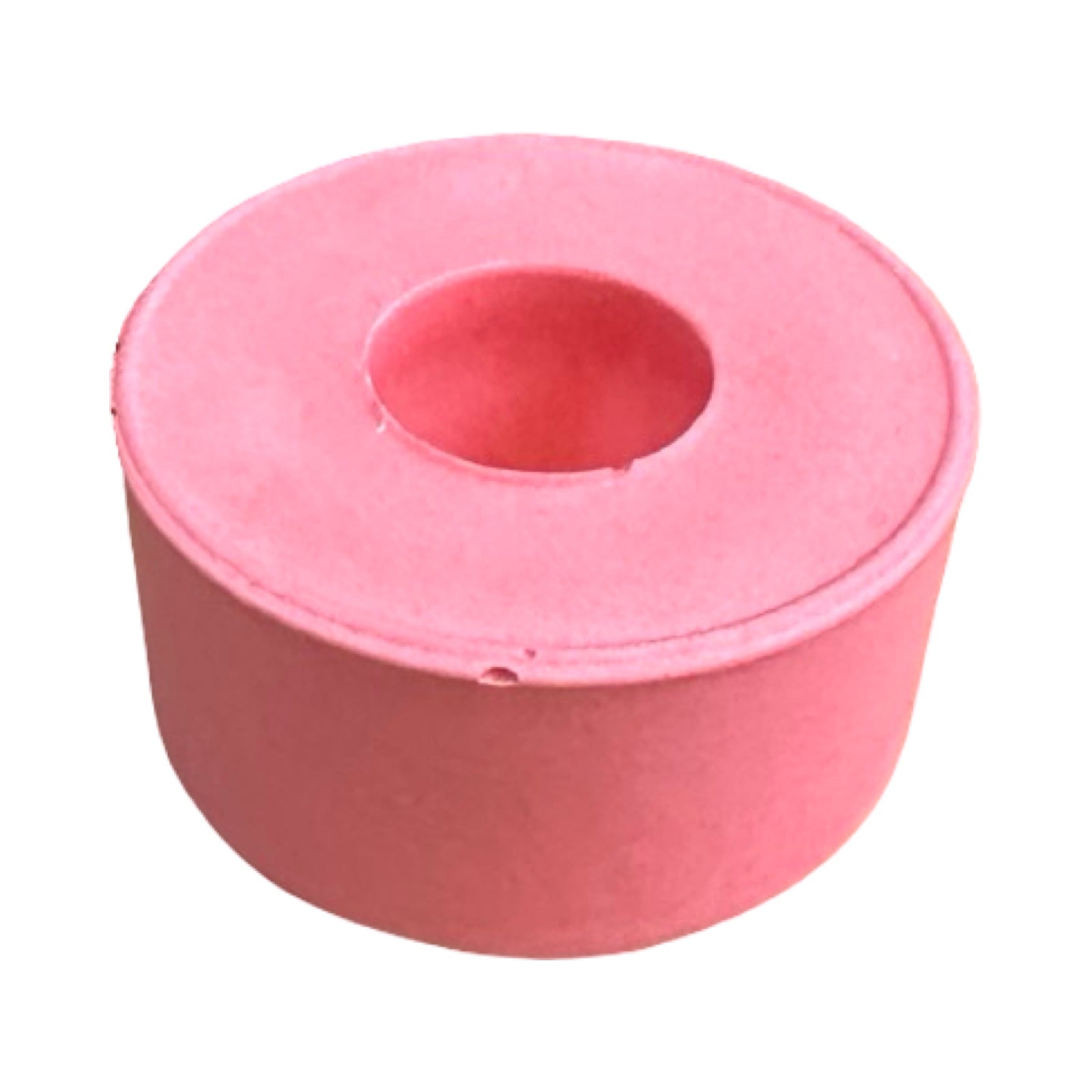 A small circular dinner candle holder in pink.