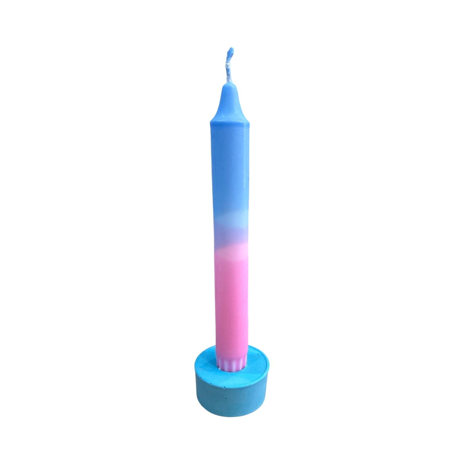 A small circular dinner candle holder in pink holding a blue and pink blended dinner candle.