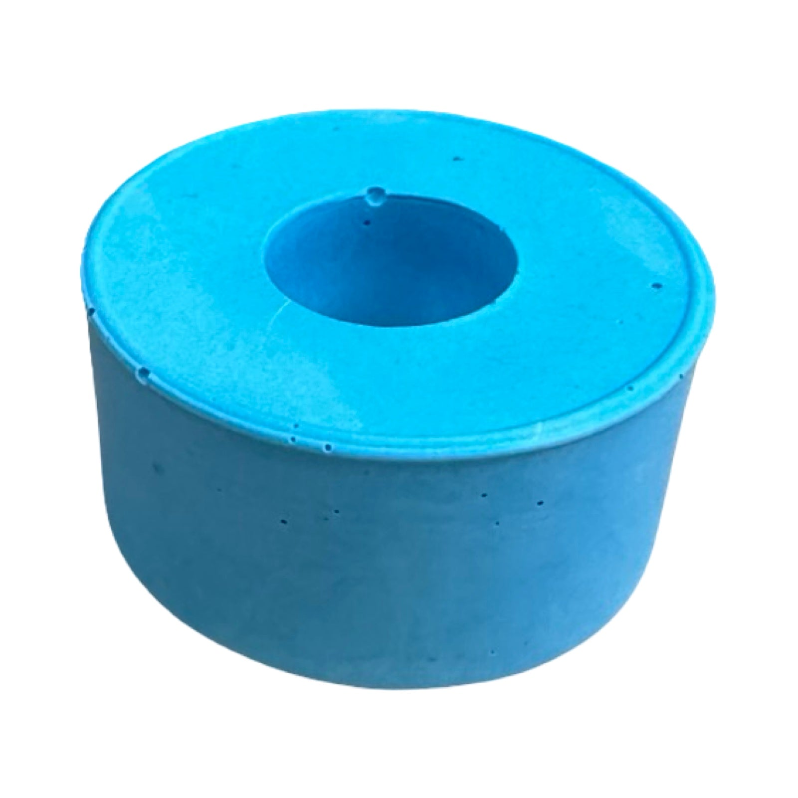A small circular dinner candle holder in turquoise.
