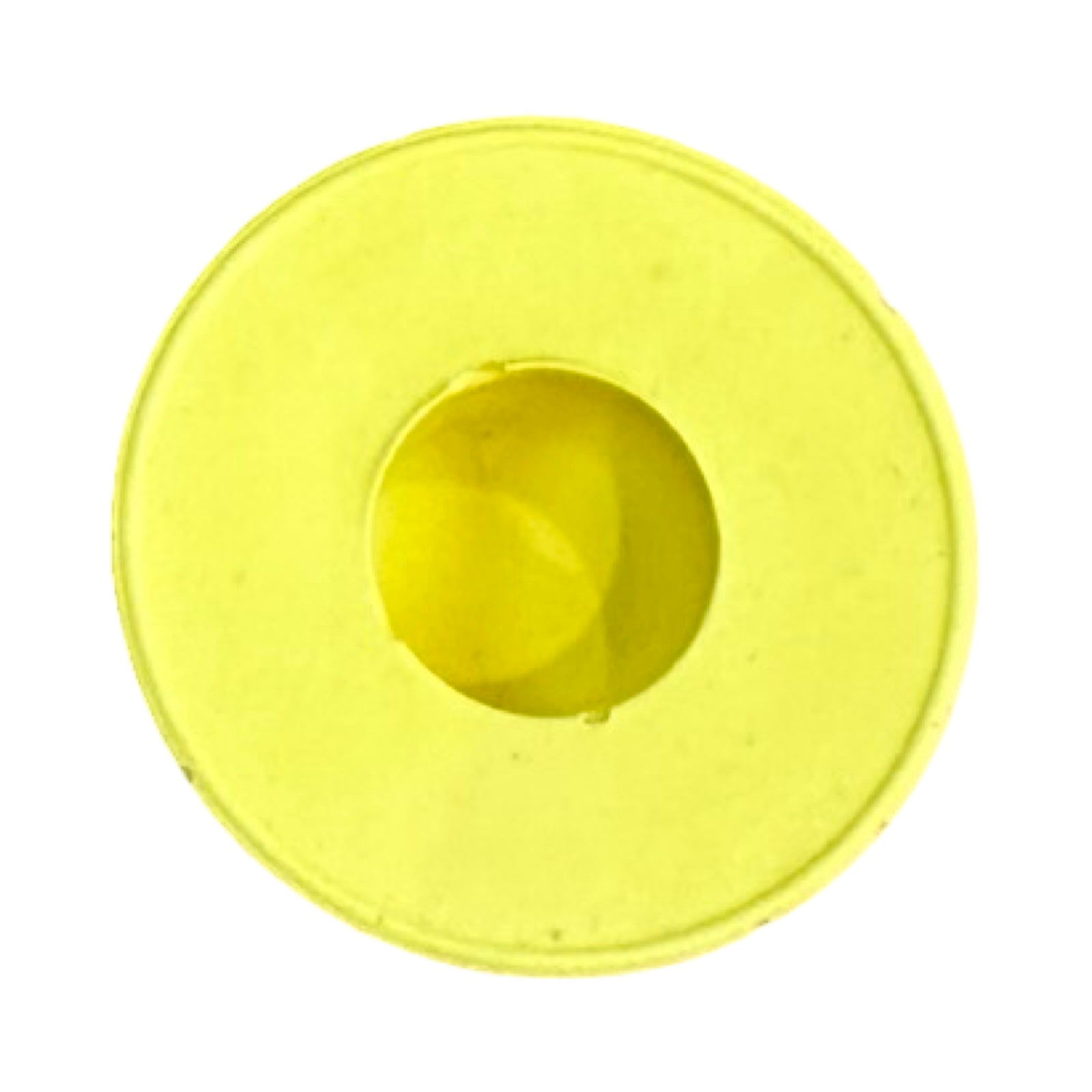 The top of a small circular dinner candle holder in yellow.