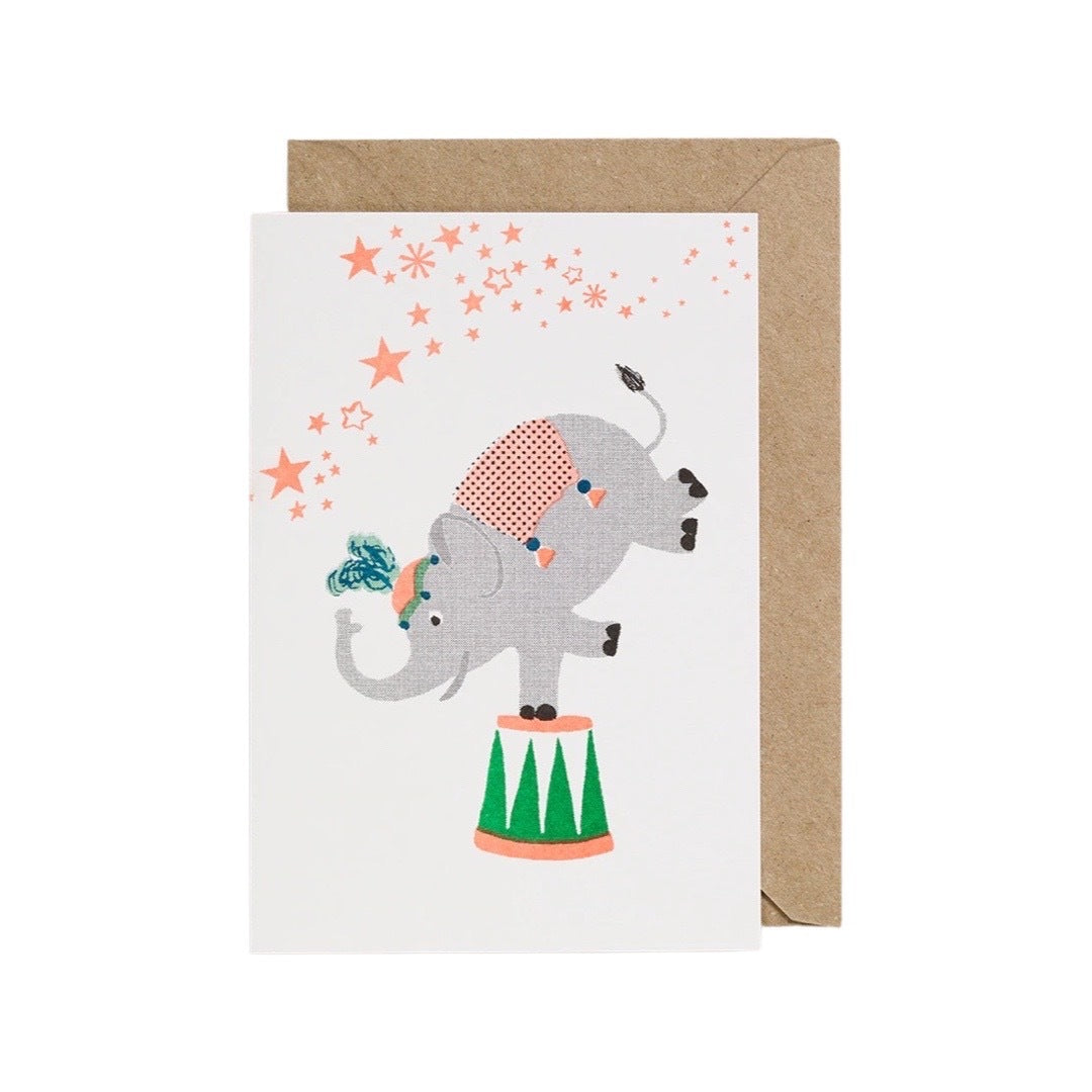 Card featuring a fun illustration of a circus elephant balancing on one leg.