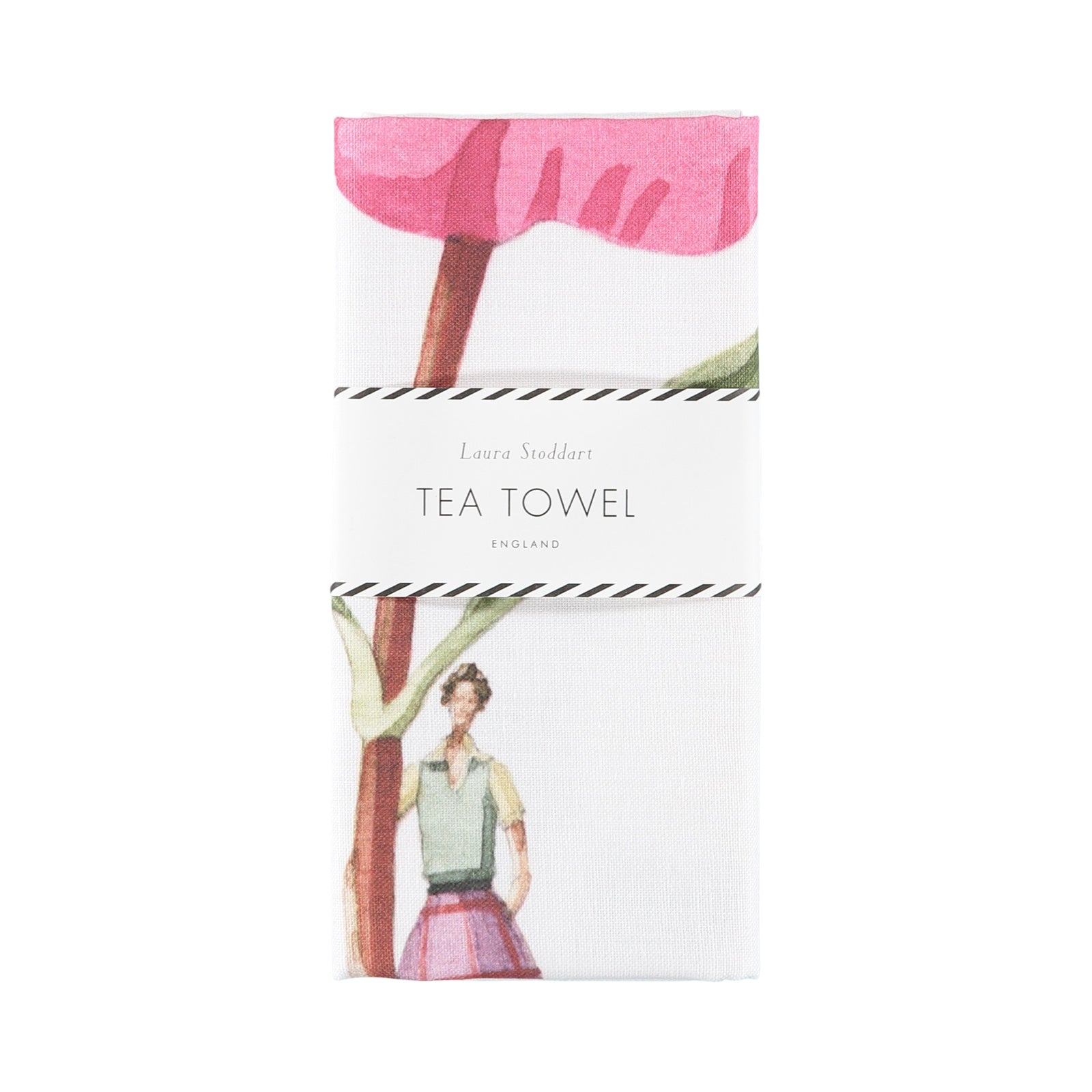 A white tea towel featuring an illustration of a lady dressed in a pink checked skirt, blue shirt and grey boots holding a giant pink cistus flower folded with a paper belly band.