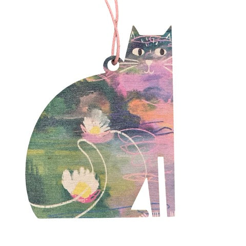 Cat-shaped wooden decoration featuring an illustration of a lily pond inspired by Claude Monet.