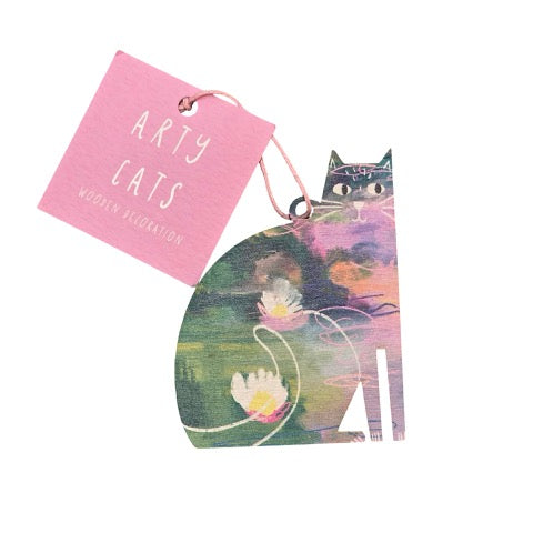 Cat-shaped wooden decoration featuring an illustration of a lily pond inspired by Claude Monet.
