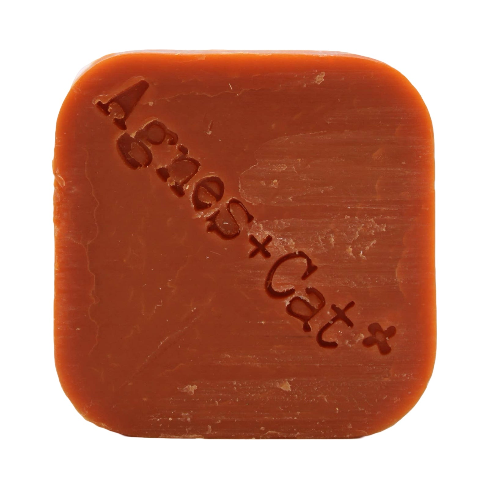 A square-shaped orange, clementine scented dry shampoo bar.