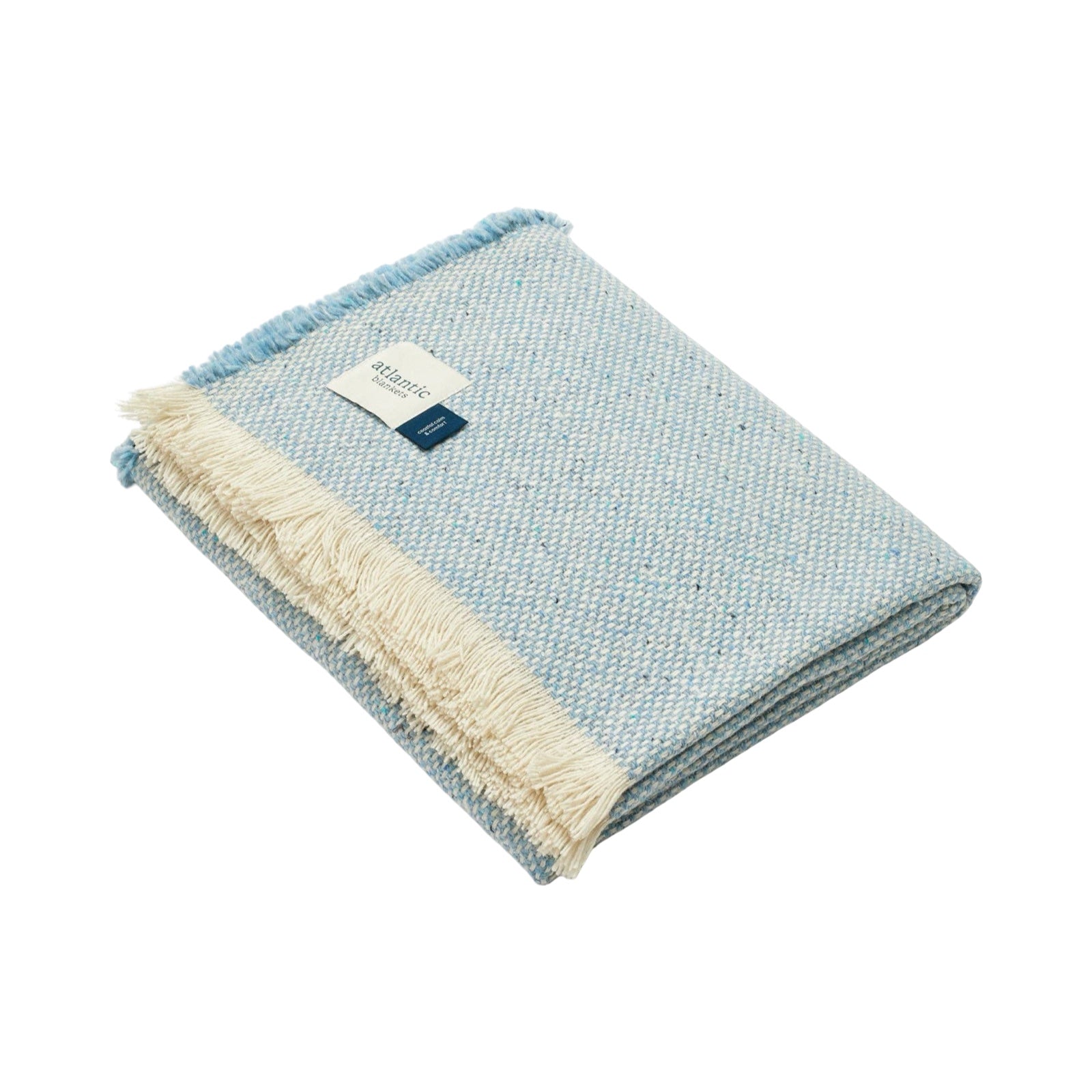 Cosy coastal blue blanket folded up.