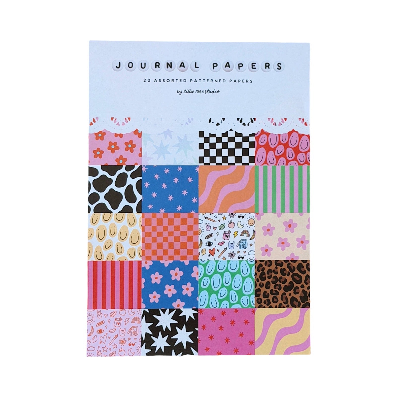 Journal Papers with assorted patterned papers on a white background.