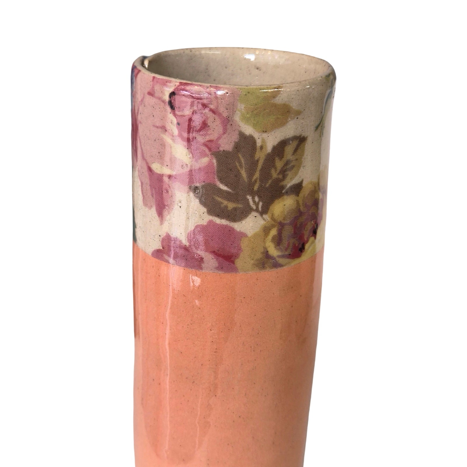 Cylindrical vase with floral pattern on a white background.