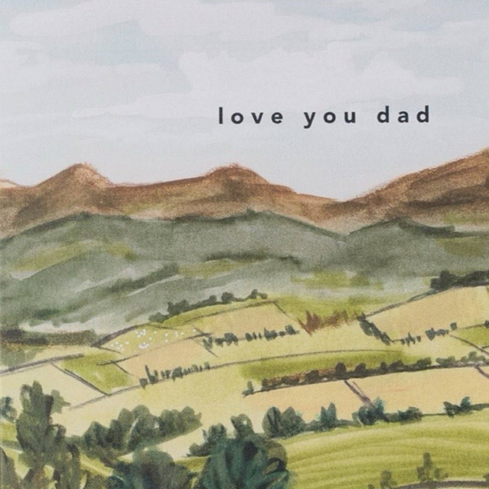 Greeting card with landscape illustration and 'love you dad' text.