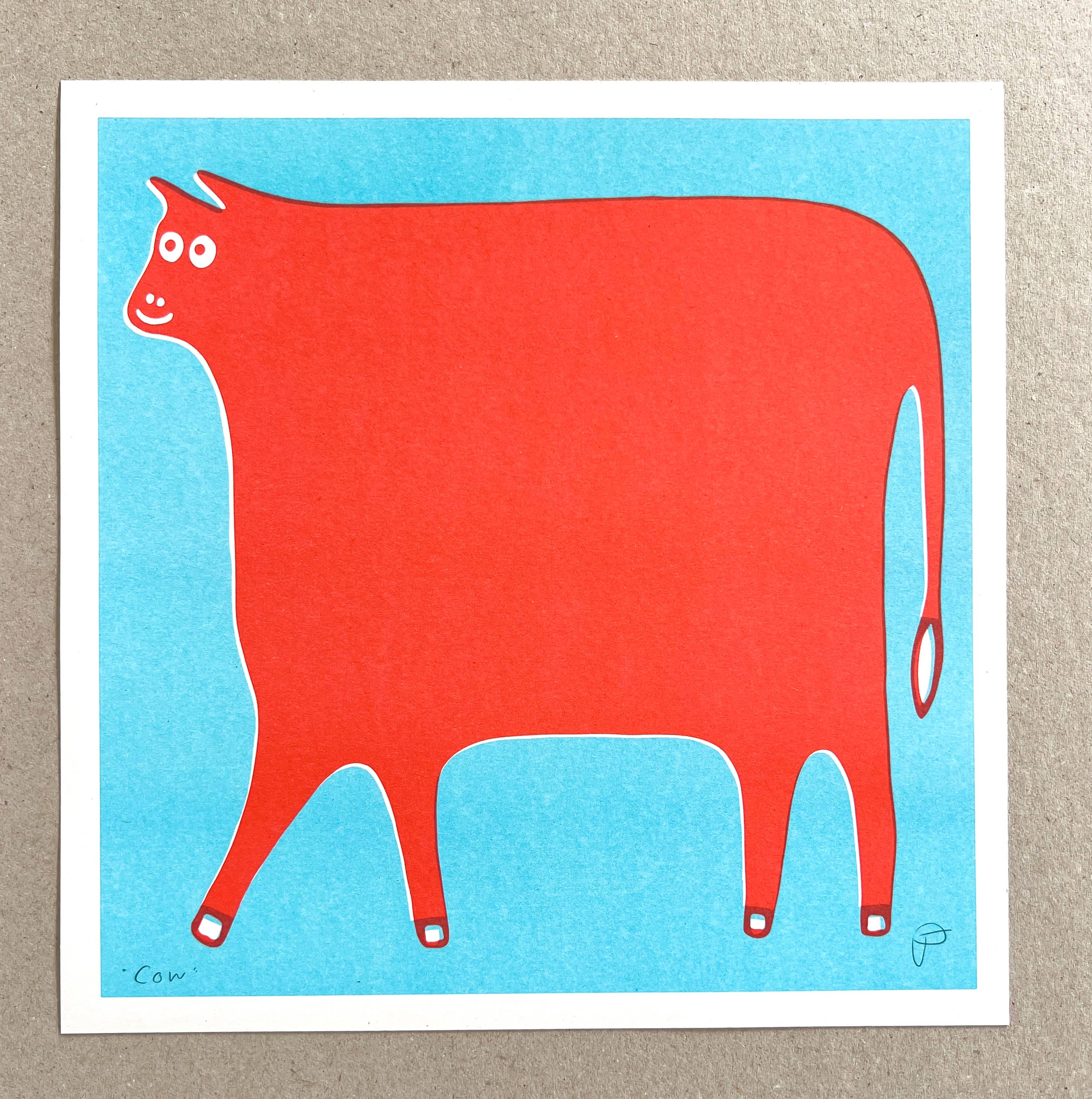 Red cow illustration on a blue background.
