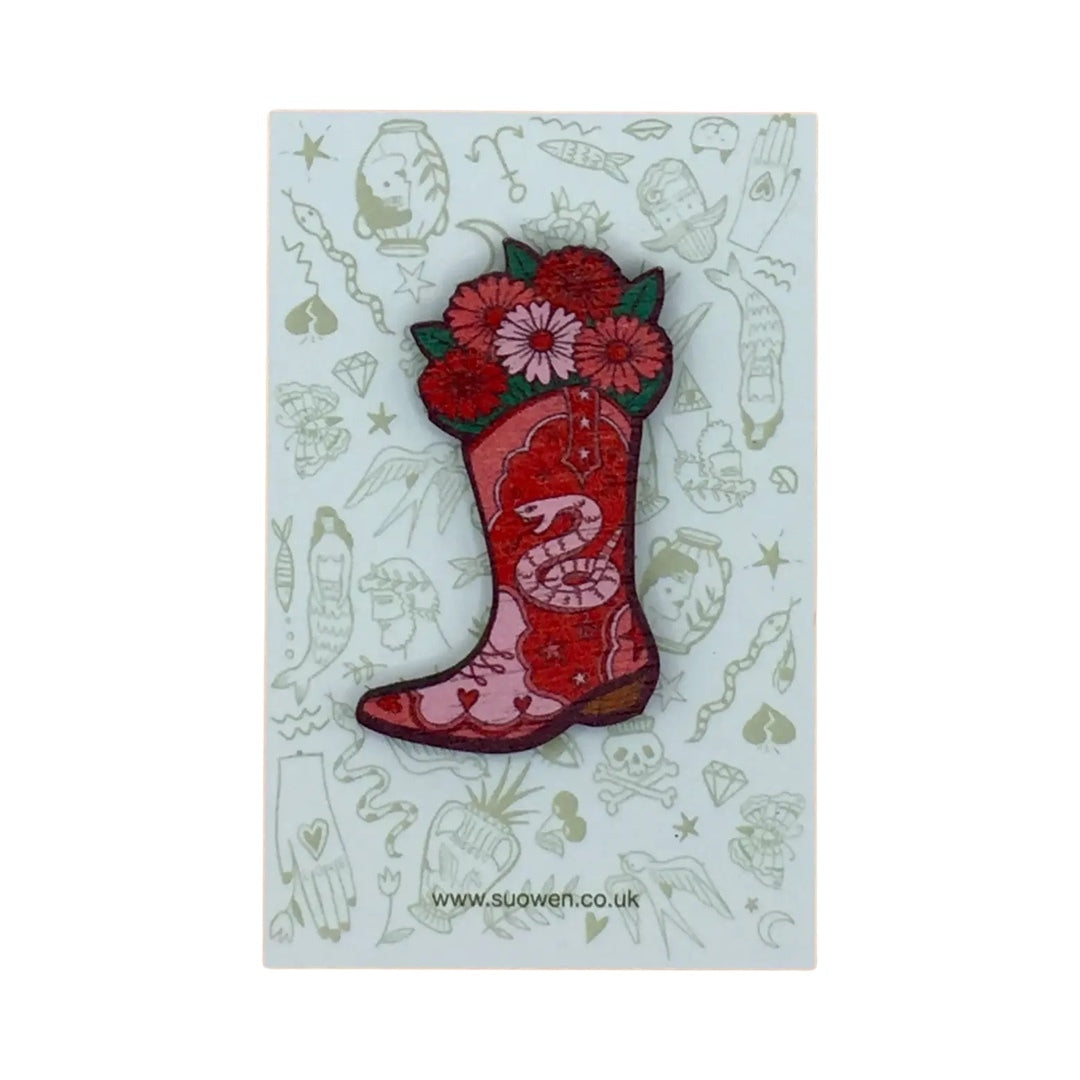 Pink and red cowboy boot wooden brooch with a pink snake and pink and red flowers.
