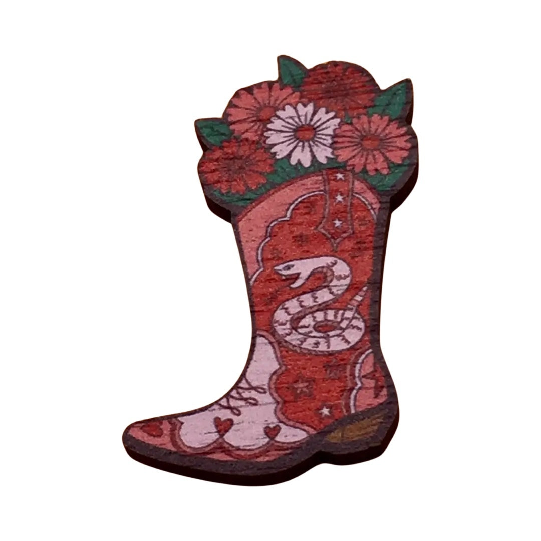 Pink and red cowboy boot wooden brooch with a pink snake and pink and red flowers.