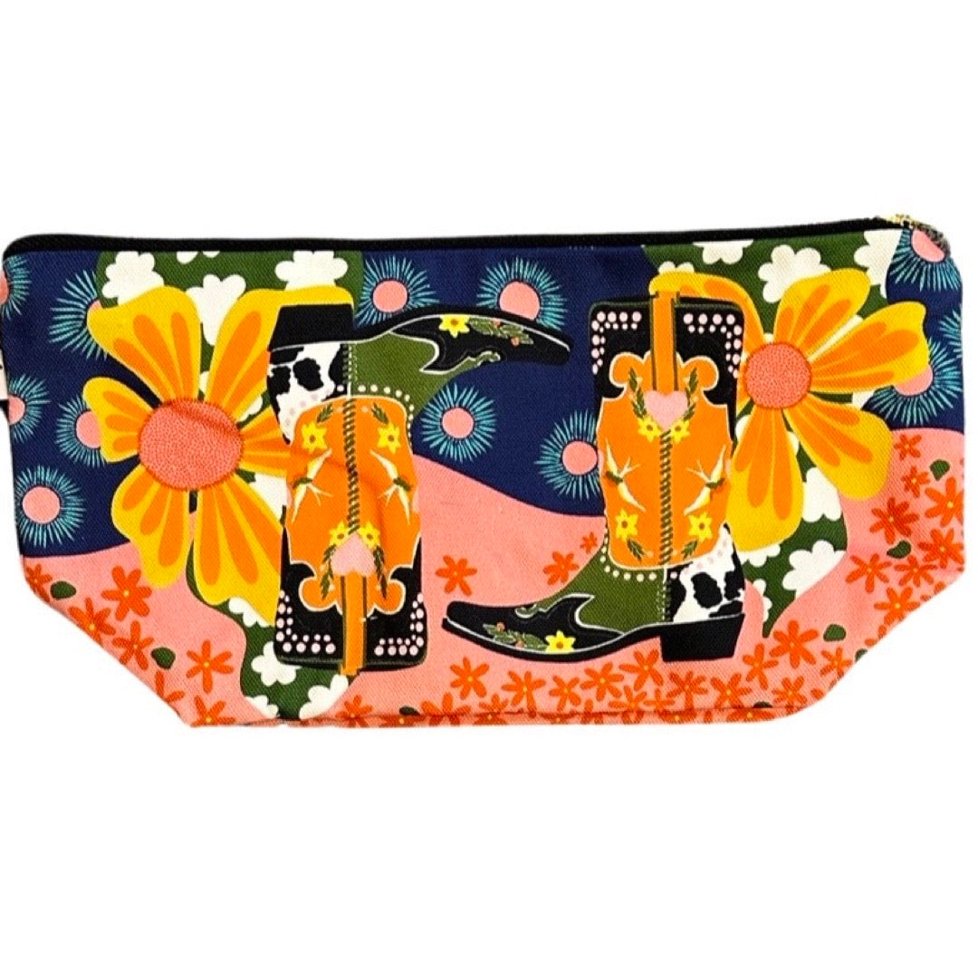 Colorful pouch with cowboy boots and flowers on a white background.