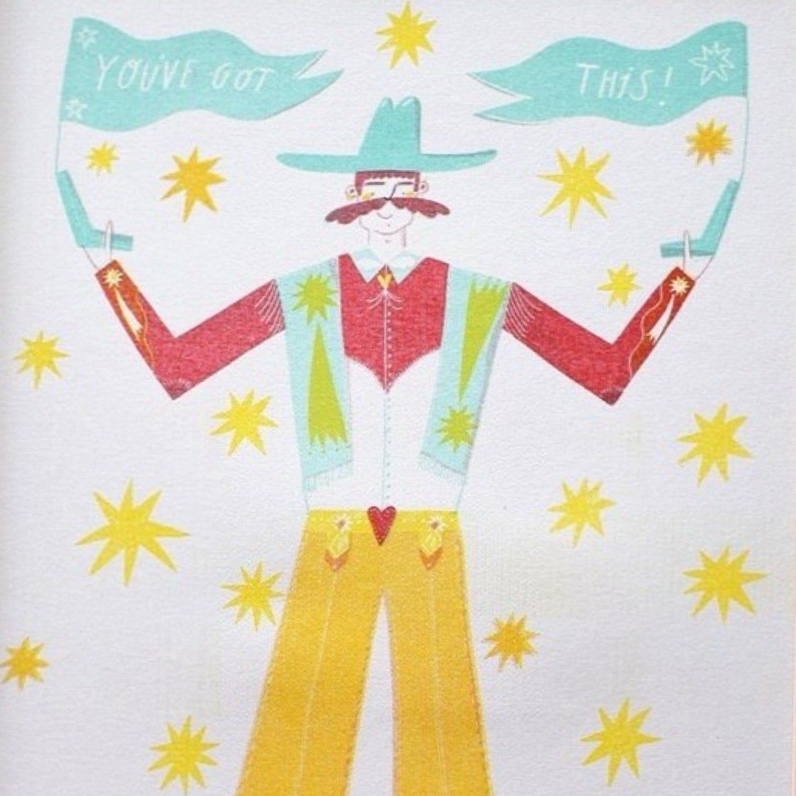 This print features an illustration of a cowboy, dressed in yellow trousers, a red shirt, a green waistcoat and a blue cowboy hat and boots.