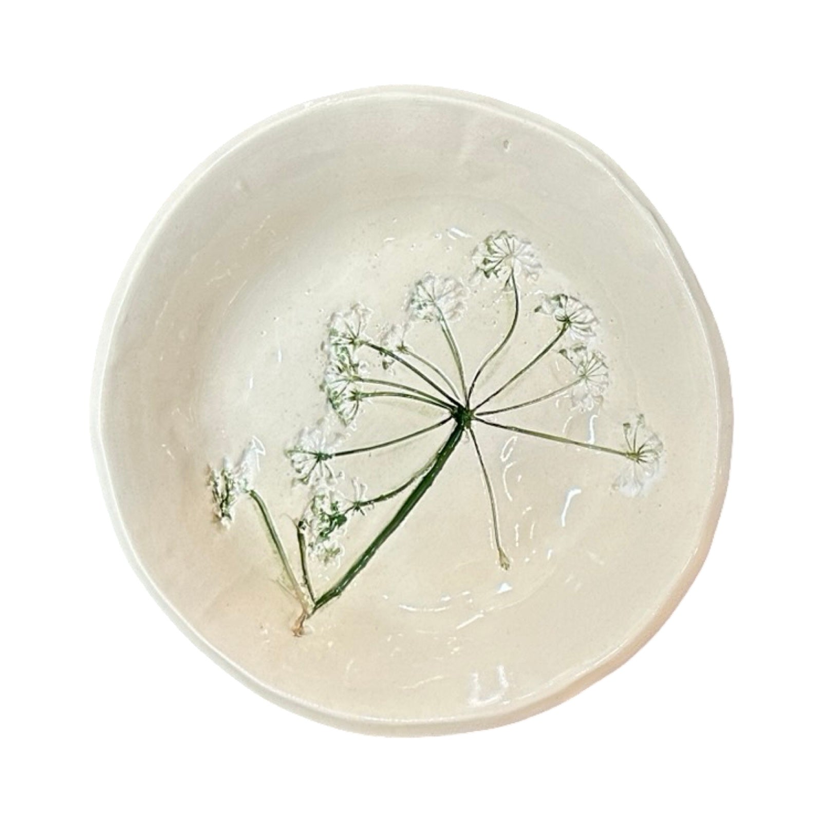 Ceramic bowl with a floral design on a white background.