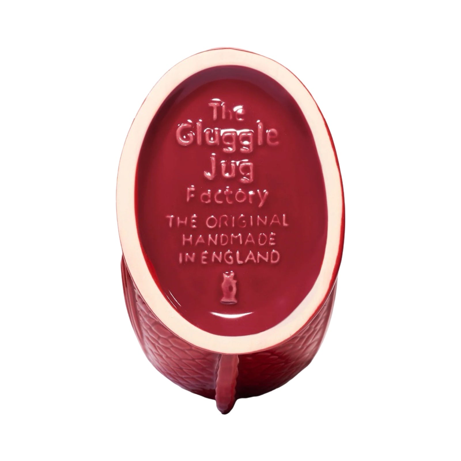 Bottom of cranberry gluggle jug.