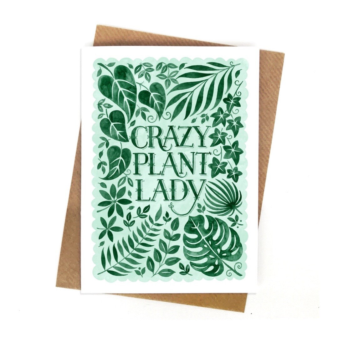 A card with lots of green foliage and the text 'crazy plant lady' in the centre, all on a paler green background with a white border.