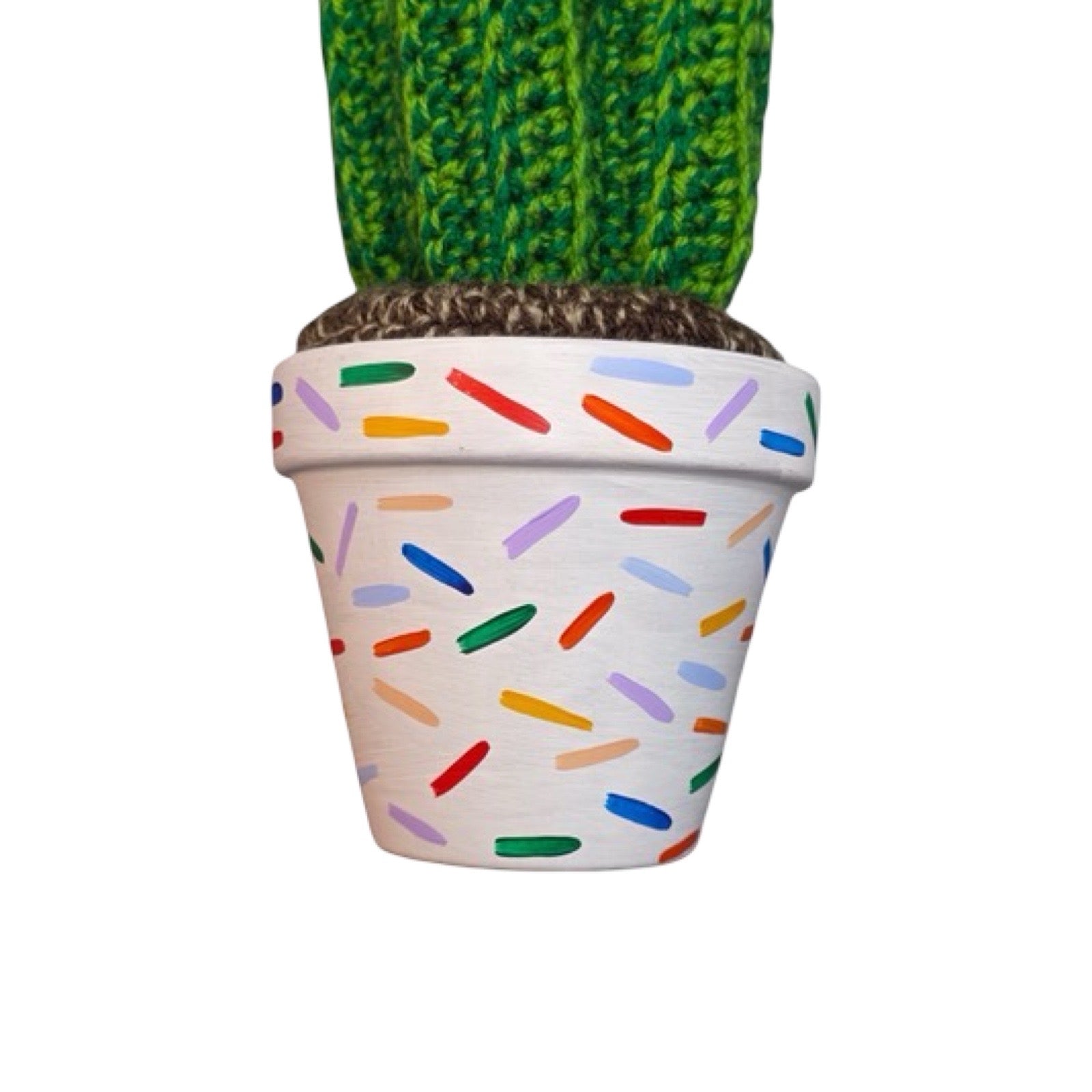 Large crochet cactus with four stems in a white hand painted pot with confetti design.