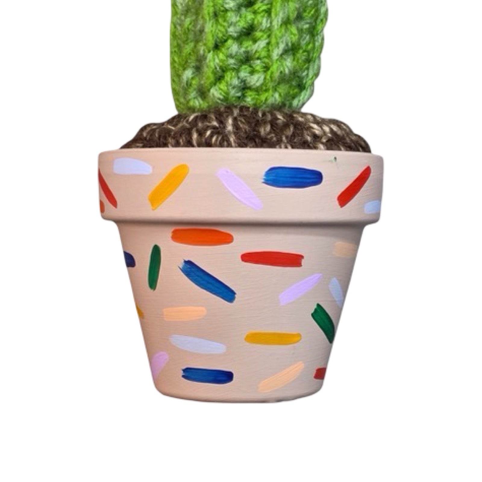 Small tall crochet cactus with pink flower in a mushroom coloured pot and confetti design.
