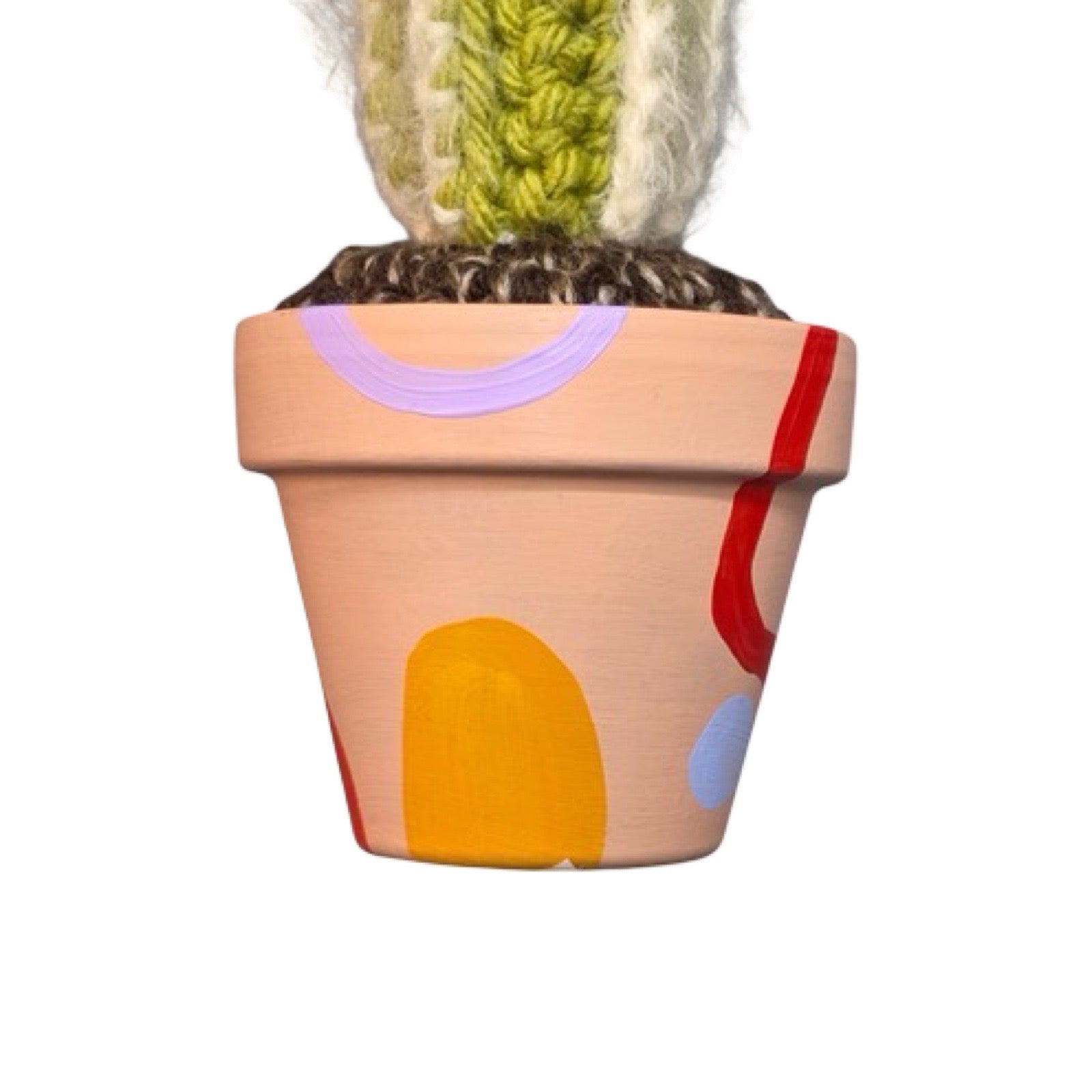 small tall striped crochet cactus with an orange flower